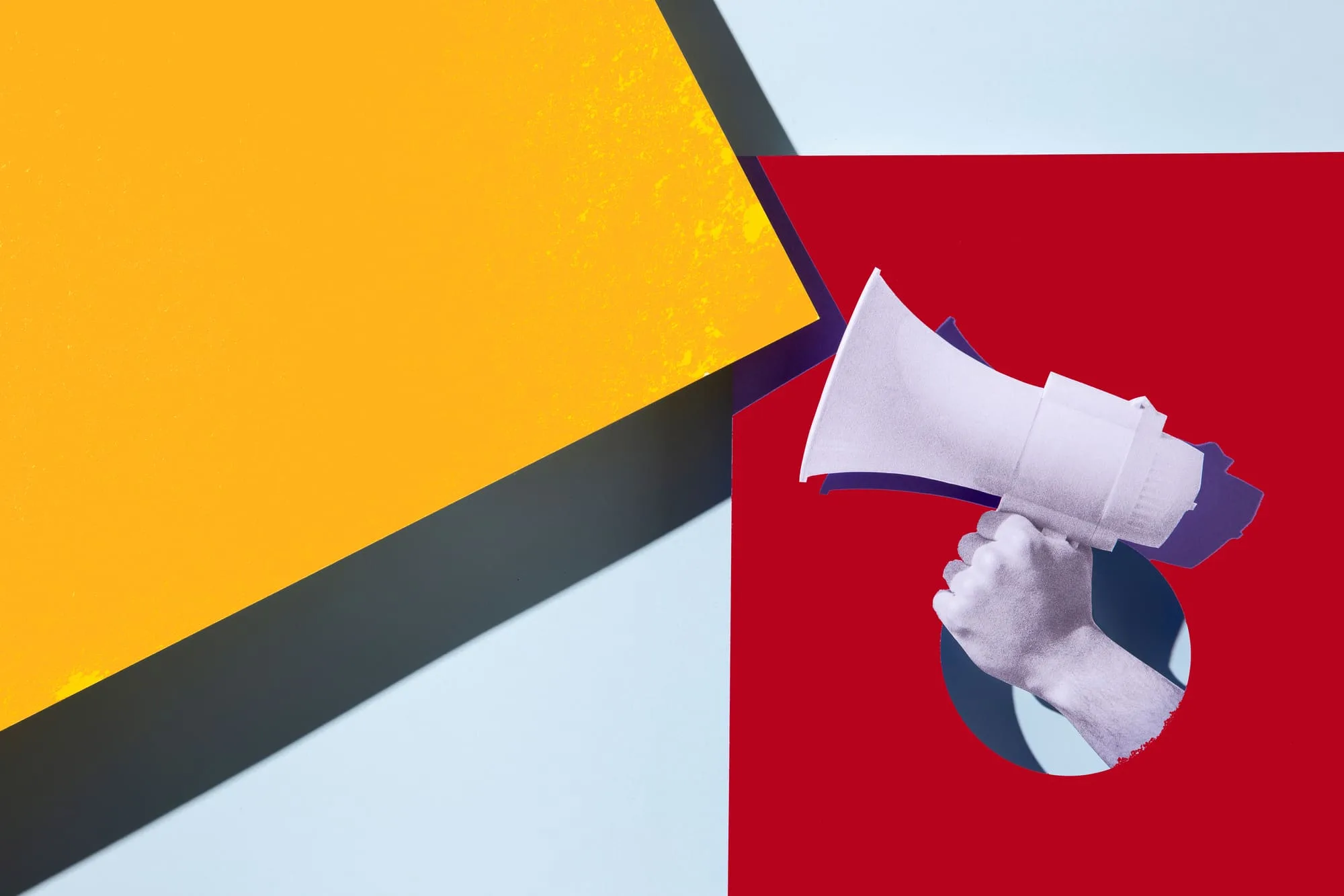 hand-holding-megaphone-paper-style (1)