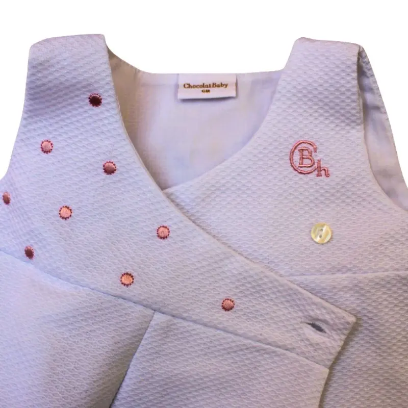 vestido bebé blanco con bordado rosa