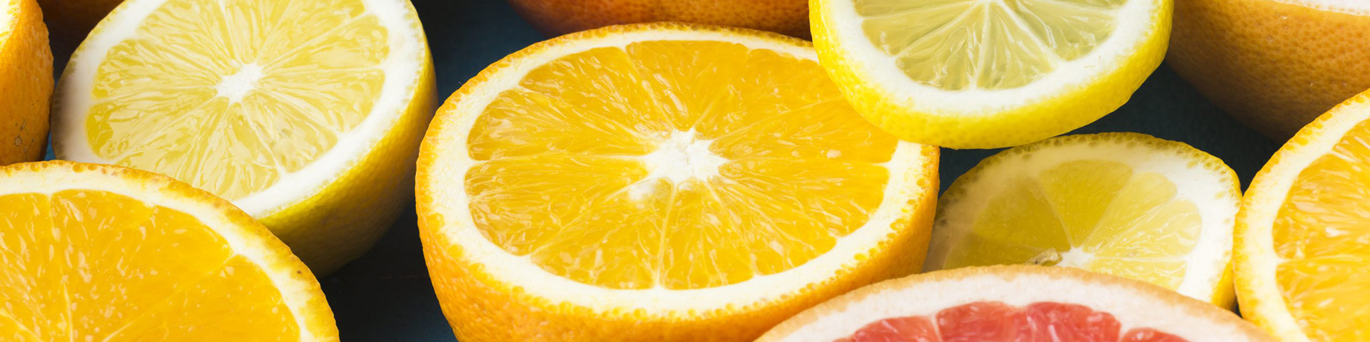 close-up-view-healthy-citrus-fruits-cut-1920