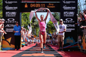 SUNSHINE COAST, AUSTRALIA - SEPTEMBER 04: Holly Lawrence of United Kingdom celebrates winning the Ironman 70.3 World Championship on September 4, 2016 in Sunshine Coast, Australia. (Photo by Matt Roberts/Getty Images)